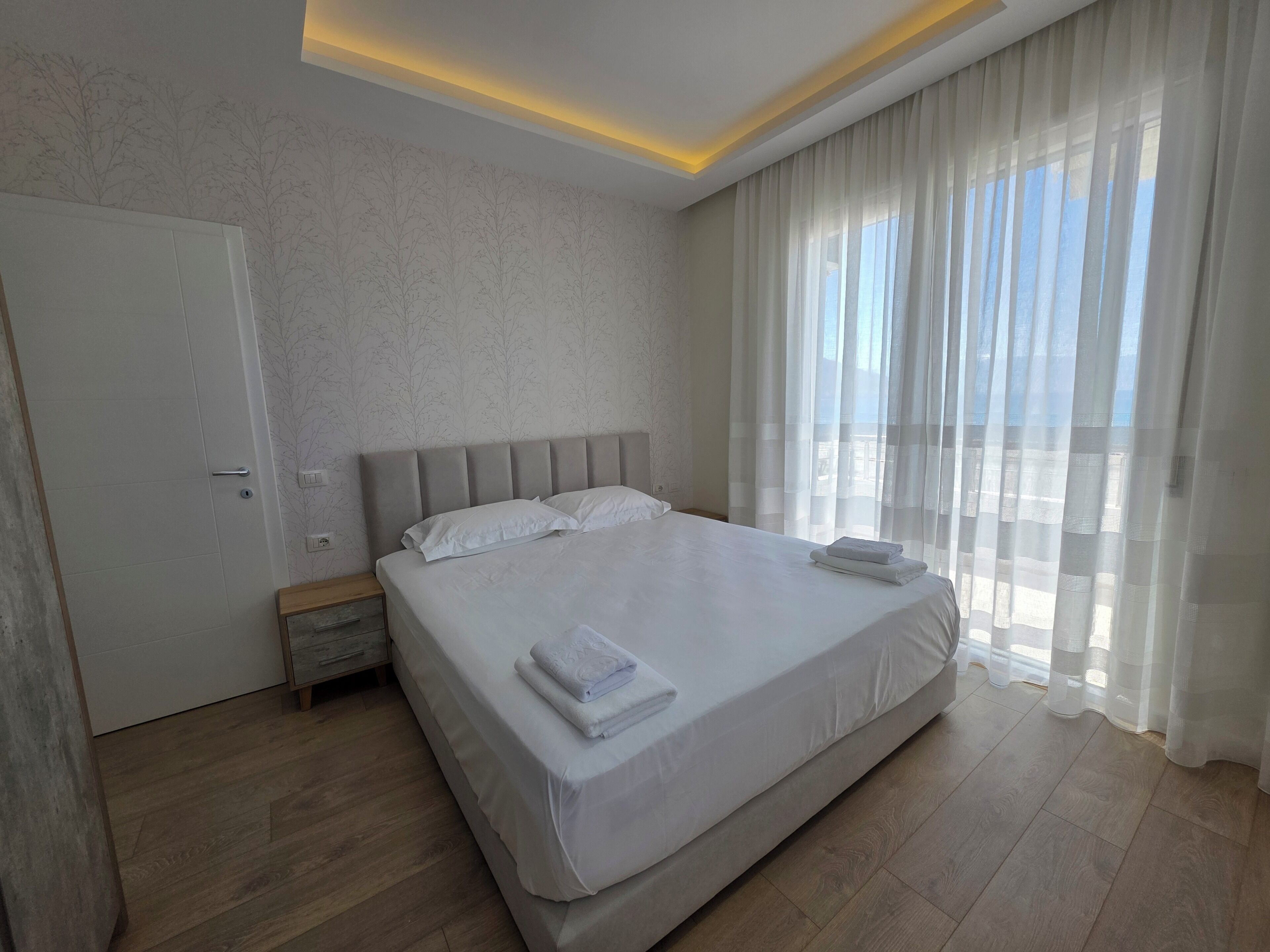 Family Apartment, Balcony, Beach View | Iron/ironing board, free WiFi