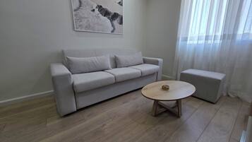 Appartamento familiare, balcone, vista spiaggia | Area soggiorno