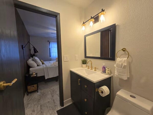 Hair dryer, towels, soap, toilet paper