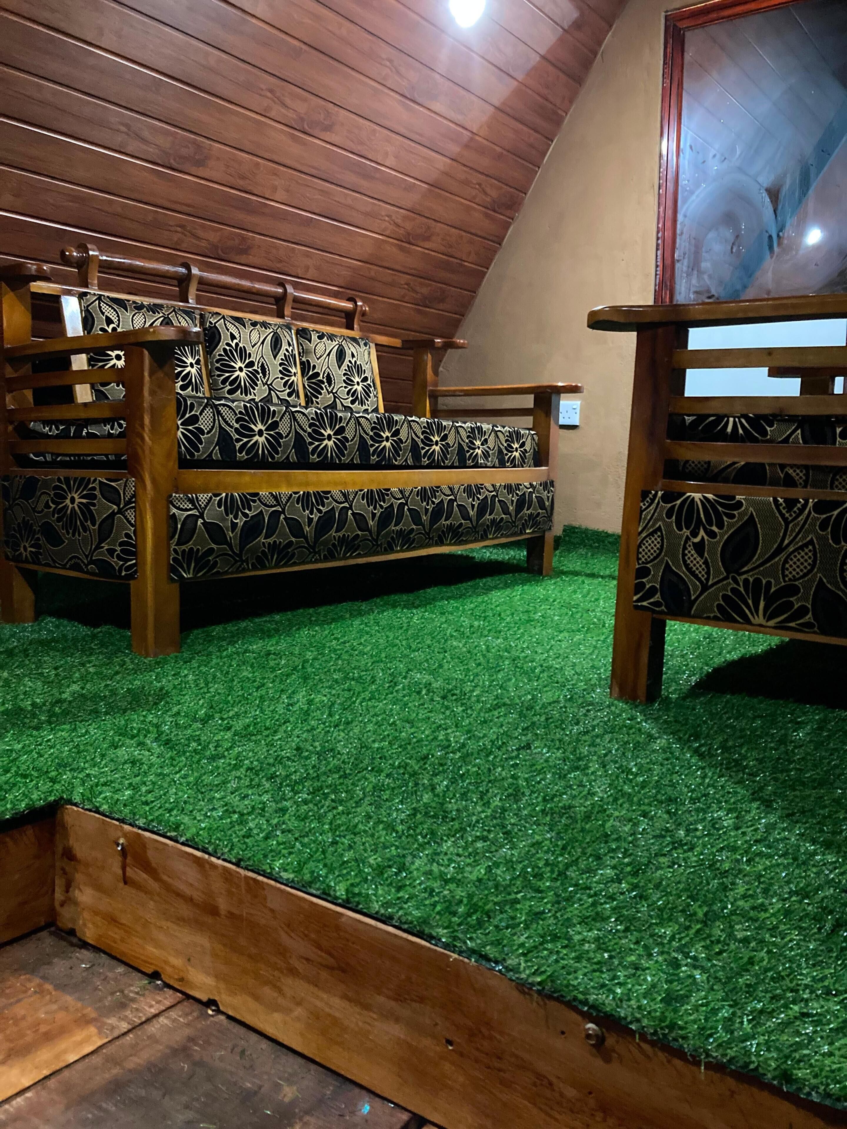 Deluxe chalet, uitzicht op tuin | Woonruimte
