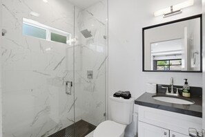 Shower, hair dryer, towels, soap