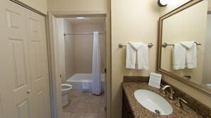 Hair dryer, towels, soap, shampoo