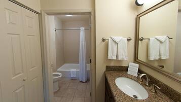 Hair dryer, towels, soap, shampoo