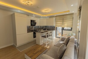 Departamento Confort, balcón | Interior