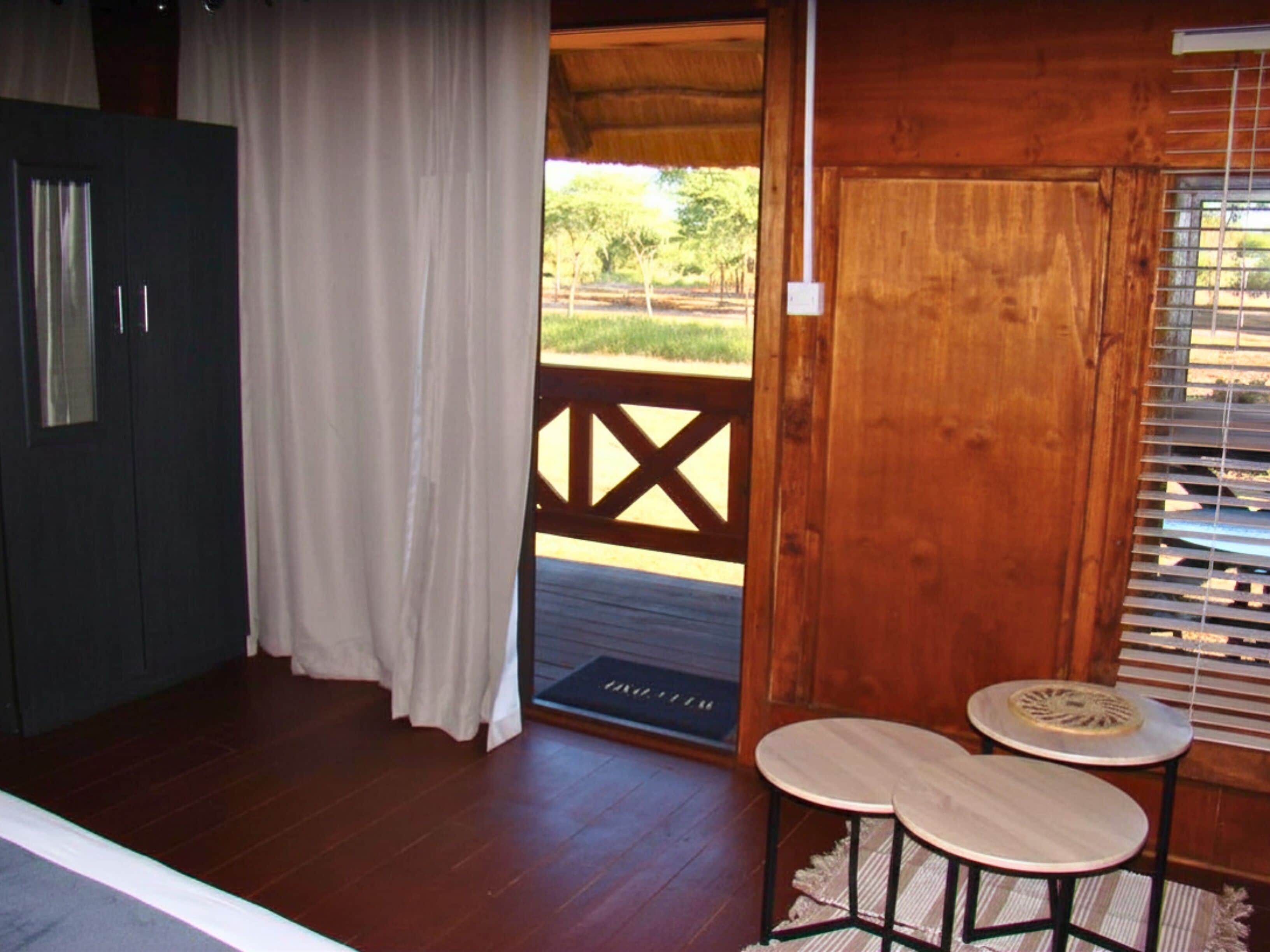 Quadruple Room, Balcony, Garden View | Laptop workspace, blackout drapes
