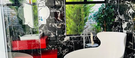 Luxury Room, Pool View | Bathroom | Towels, soap, toilet paper