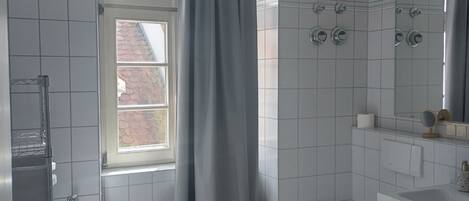 Hair dryer, towels, soap, toilet paper