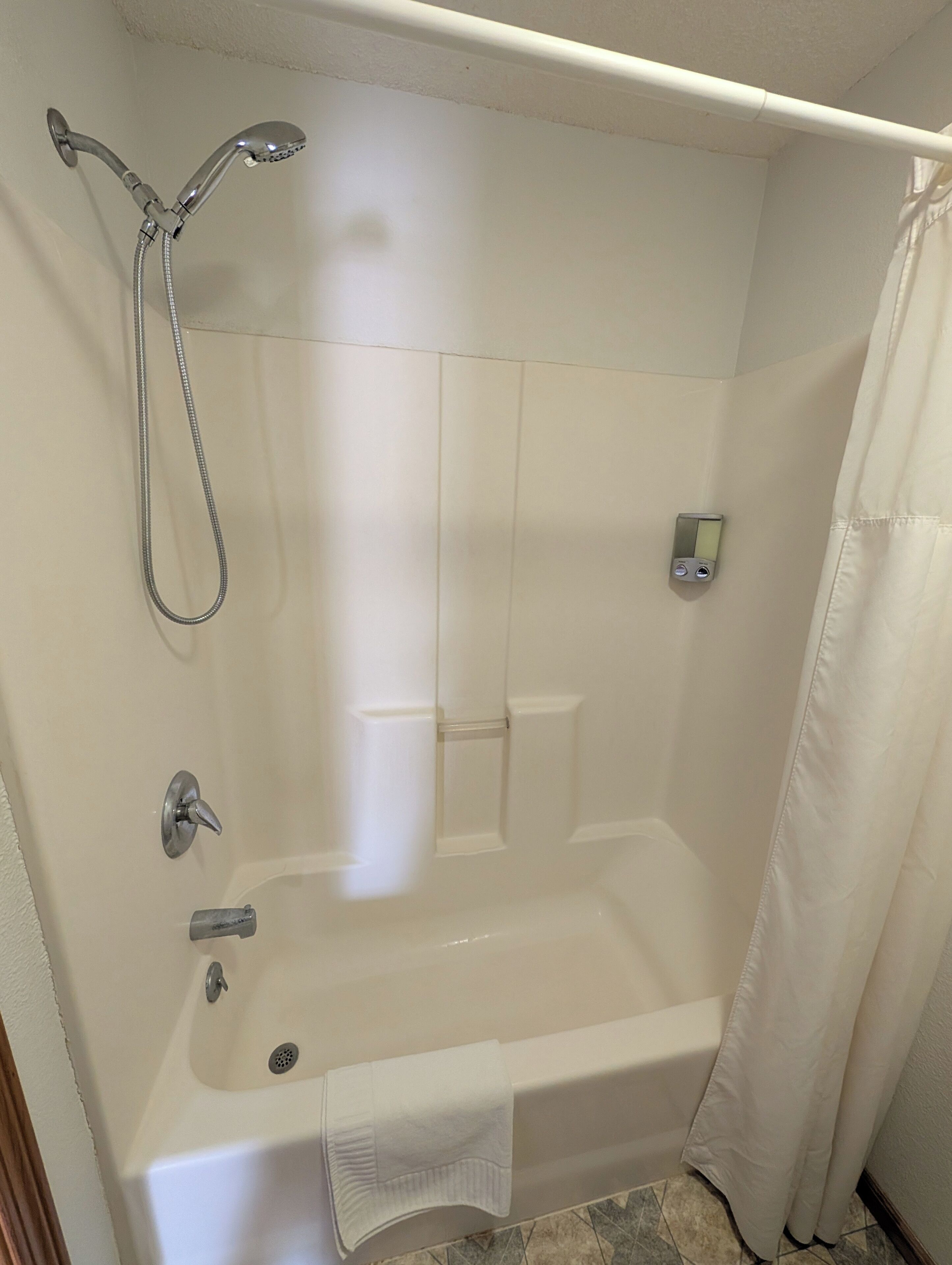 Hair dryer, towels, soap, shampoo