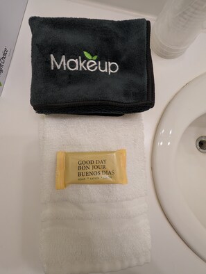 Hair dryer, towels, soap, shampoo
