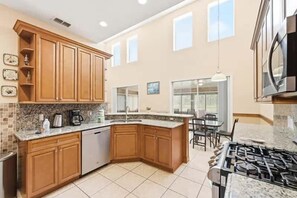 Fridge, microwave, oven, stovetop - Family Home with Private Pool Near Disney (Kissimmee)
