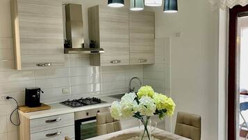 Microwave, stovetop, coffee/tea maker, electric kettle