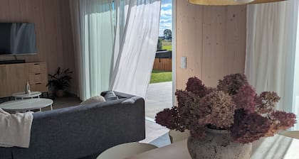 Scandinavian Villa with sauna and hot tube and big garden.