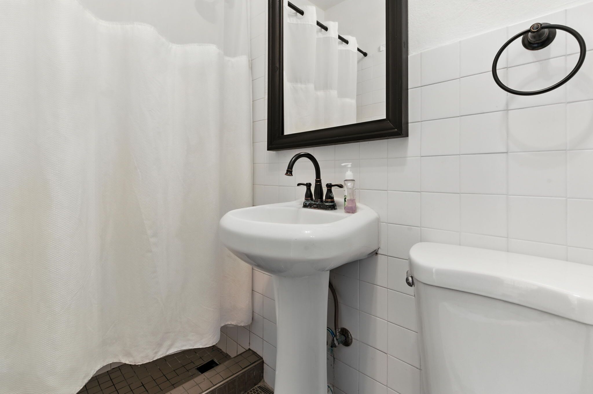 Shower, hair dryer, towels, shampoo