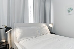 Iron/ironing board, travel crib, WiFi, bed sheets