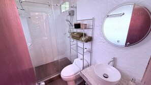 Shower, towels, soap, toilet paper