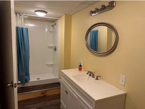 Shower, towels, soap, toilet paper