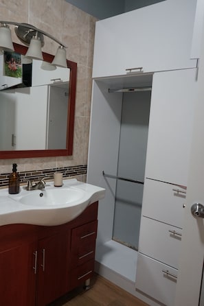 Shower, towels, soap, toilet paper