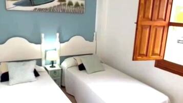 2 dormitorios, tabla de planchar con plancha, wifi gratis y ropa de cama