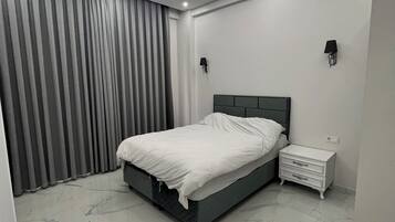 4 habitaciones, tabla de planchar con plancha, internet y ropa de cama