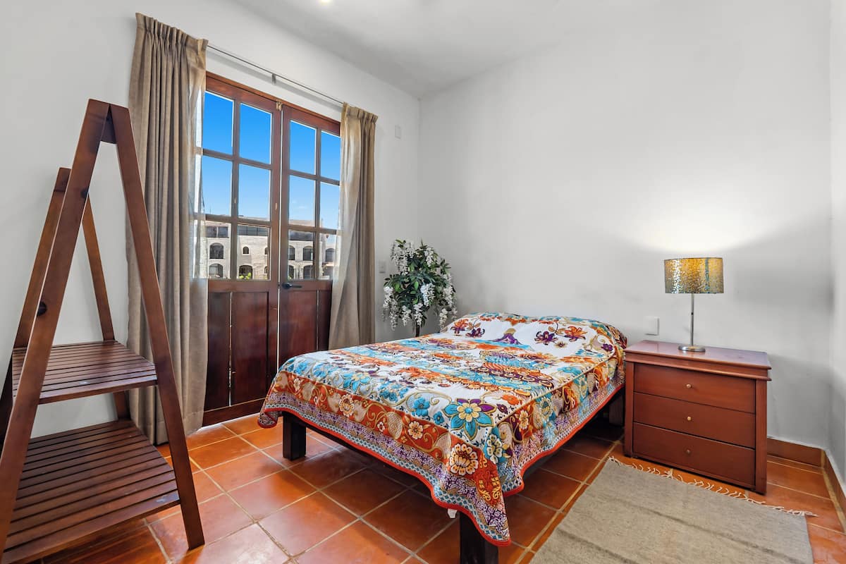Desk, laptop workspace, free WiFi, bed sheets