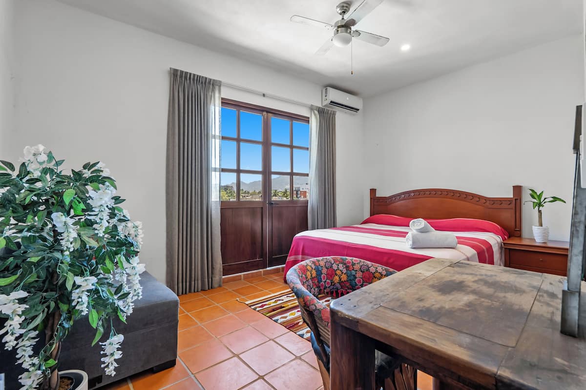 Desk, laptop workspace, free WiFi, bed sheets