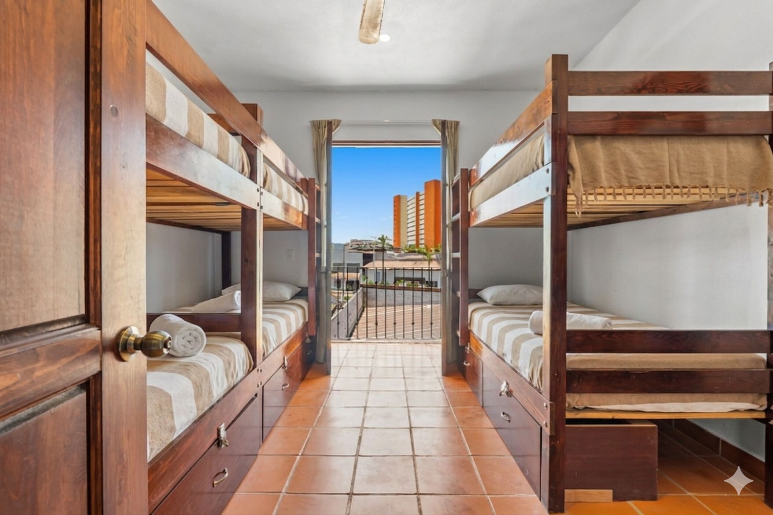 Deluxe Triple Room, Balcony, City View | Desk, laptop workspace, free WiFi, bed sheets