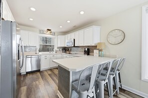 Fridge, microwave, oven, stovetop - King & Queen Suite, Bunk Room - Deck w/ Panoramic Ocean Views. Dog Friendly (North Topsail Beach)