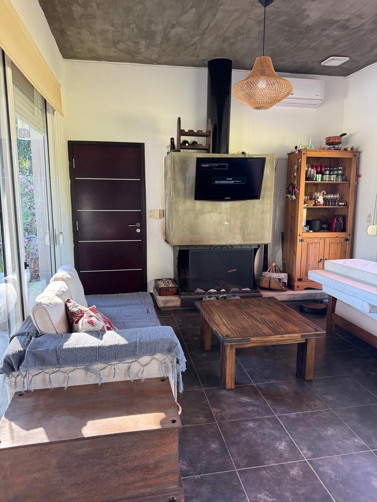 Smart TV, fireplace, books