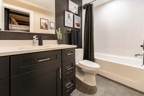 Hair dryer, towels, soap, toilet paper