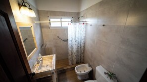 Deluxe Apartment | Bathroom | Shower, hair dryer, towels, soap - La Soleada Polo Ranch (Mercedes)