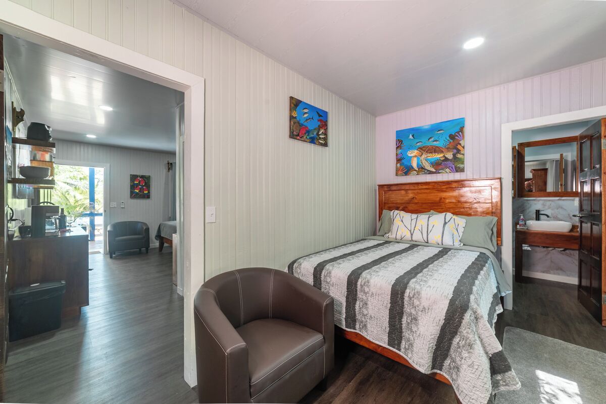 Deluxe Studio Suite, Beach View | Iron/ironing board, free WiFi