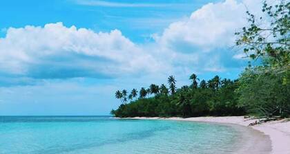 Villa Tucan Tropical Getaway just steps from Buye Beach & pool.