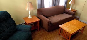 Apartment, Multiple Beds, Kitchen, Garden View (Family Suite 1st Floor) | Living area - Wilson Lake Inn (Wilton)