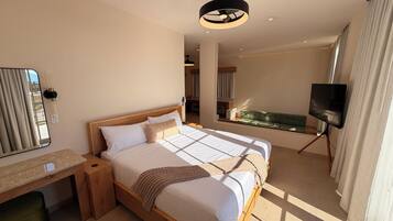 Deluxe Suite, Courtyard View | Premium bedding, iron/ironing board, free WiFi, bed sheets