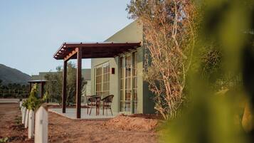 Deluxe Suite, Courtyard View | Terrace/patio
