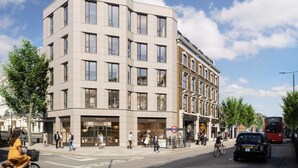 A modern building with multiple floors, large windows, and a ground-level shop. - The Pembridge Residences Building (London)