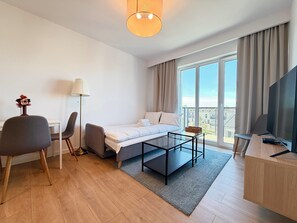Een strijkplank/strijkijzer, wifi, beddengoed