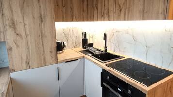 Refrigerador, horno, placa de cocina, lavavajillas