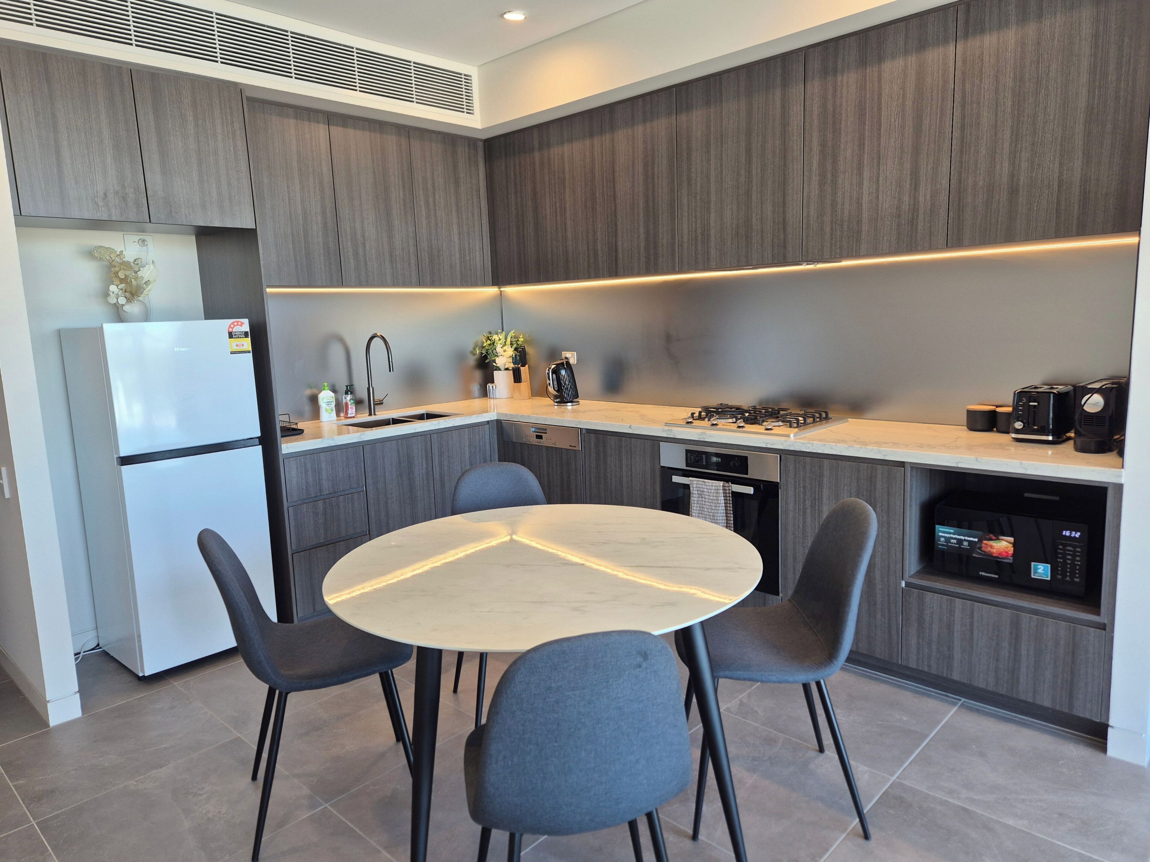 Coffee/tea maker, fridge, microwave, oven