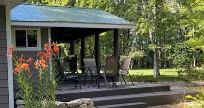 Gorgeous 2-bedroom Cozy Cabin in the Northwoods. Perfect for a relaxing getaway.