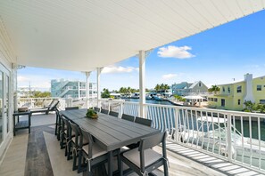 Outdoor dining - Dolphin Paradise: Pool, Elevator, Waterfront with Dock (Key Largo)