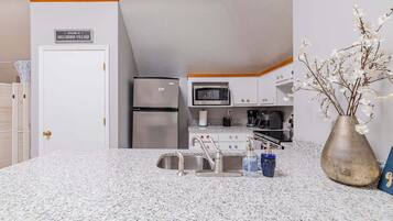 Fridge, microwave, coffee/tea maker, toaster