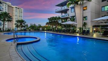 2 outdoor pools, open 8:00 AM to 9:00 AM, pool umbrellas, pool loungers