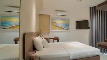 Deluxe Room, Balcony, City View | Minibar, desk, laptop workspace, free WiFi