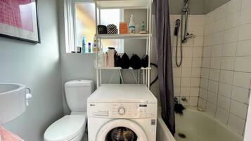 Hair dryer, towels, soap, toilet paper
