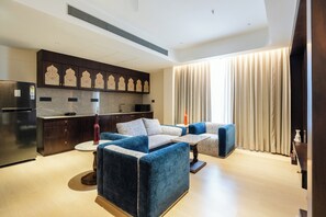 Suite estudio de lujo | Área de sala de estar