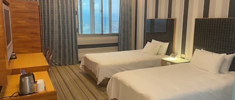 Quadruple Room, City View | Desk, laptop workspace, free WiFi