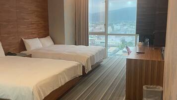 Quadruple Room, City View | Desk, laptop workspace, free WiFi