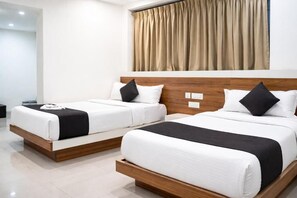 Family Room, Balcony, City View | In-room safe, desk, laptop workspace, soundproofing - Hotel Stay Prime (Pune)