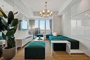 Apartment, 3 Bedrooms, City View | Living room | 50-inch Smart TV with cable channels, Netflix, streaming services - Narel by Kozystay - Kuningan (Jakarta)